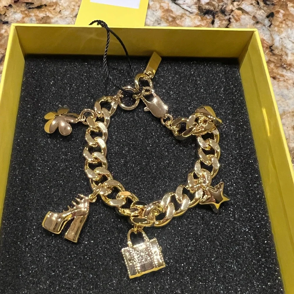 Marc Jacobs Gold Charm Bracelet with 5 Charms - Picture 6 of 8